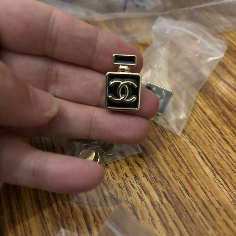 CHANEL Black and Gold Logo earrings , beautiful and stunning